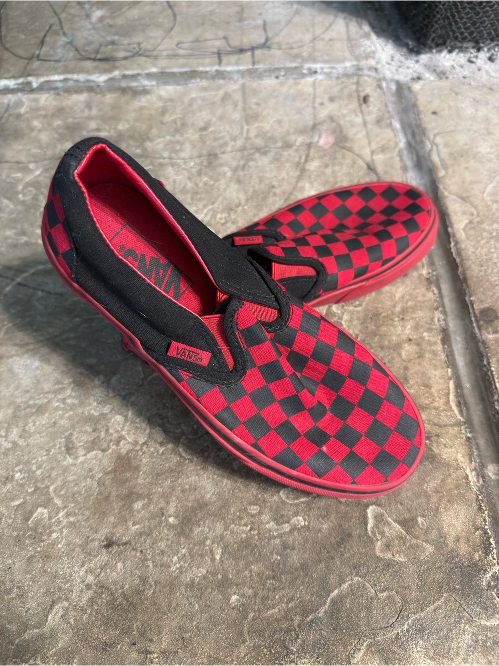 Vans Red & Black Checkerboard Slip-On Sneakers